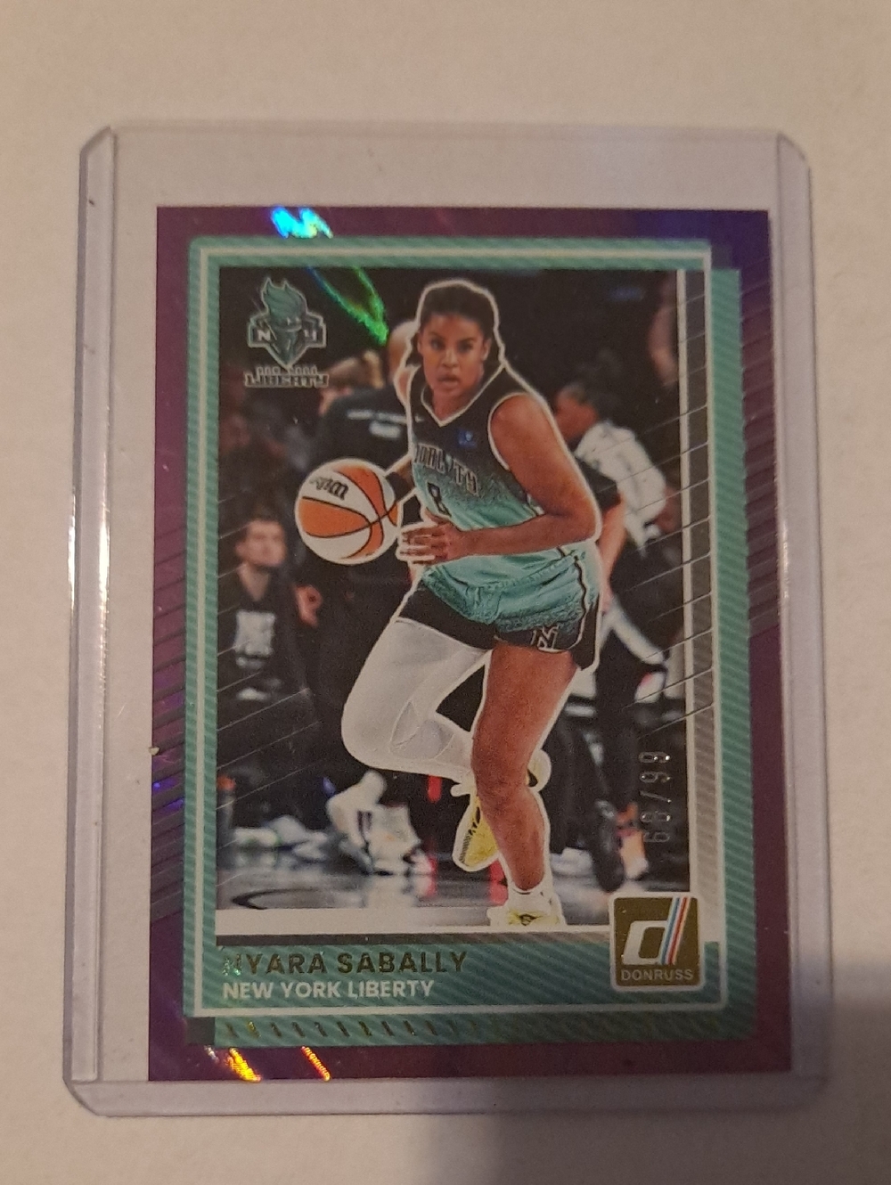 Nyara Sabally Purple Laser Parallel Numbered Card 68/99